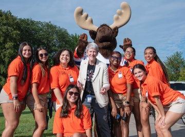 Provost Nesbitt with Trax and Students welcoming first years to campus Fall 2023